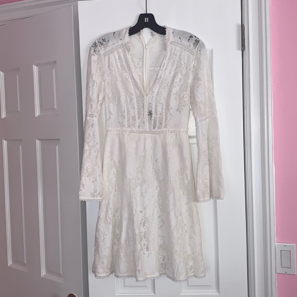 A line white lace BCBG dress with bell sleeves